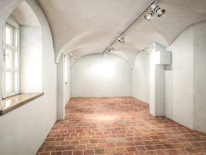 Visualisierung Nonntal, Salzburg, Atelier im Kellerbereich ohne Inventar. Boden aus Terracotta.