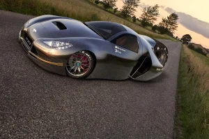 Futuristisches Elektroauto mit drei Rädern. Ein großes Antriebsrad am Heck. Karosserie ist aus Carbon. Auto steht auf einer Straße vor einer Wiese beim Sonnenuntergag.