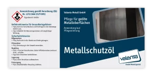 Valetna Metall Verpackungslabel für Metallschutzöl, mit dem Motiv einer Verkleidung aus Schwarzstahl mit dem Text Metallschutzöl, Pflege für geölte Metalloberflächen, Anwendung laut Pflegeanleitung und das Logo. Zusäzlich Gefahren und Sicherheitshinweise auf der Rückseite